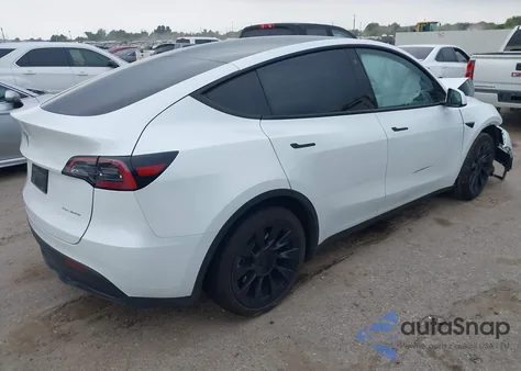 2023 Tesla Model Y from USA, damaged, VIN 7SAYGDEE4PA044024
